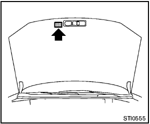 The air conditioner specification label is attached to the underside of the hood