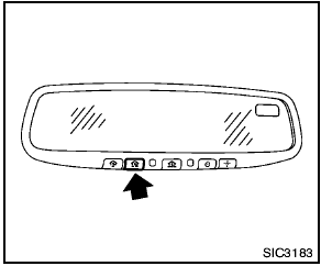 3. Using both hands, simultaneously push and hold both the HomeLink® button you