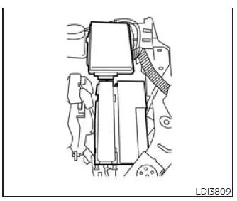 Engine compartment fuse box location and cover removal tab