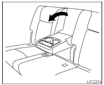 Rear armrest storage tray for rear passengers