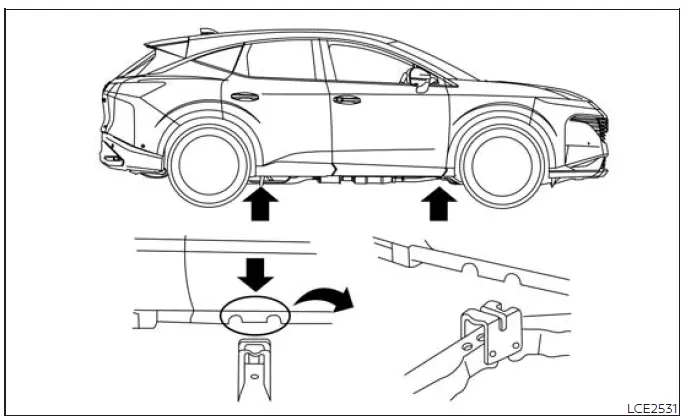 Nissan Murano spare tire exposed after subwoofer is moved aside