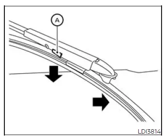 Rear window wiper blade removal position and release tabs